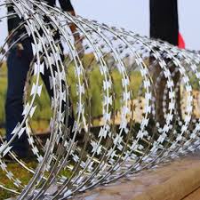 A roll of razor wire on top of a fence in Juba, South Sudan.