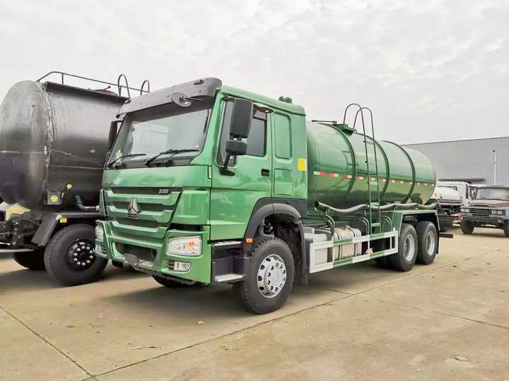  a green sewage truck in Juba, South Sudan