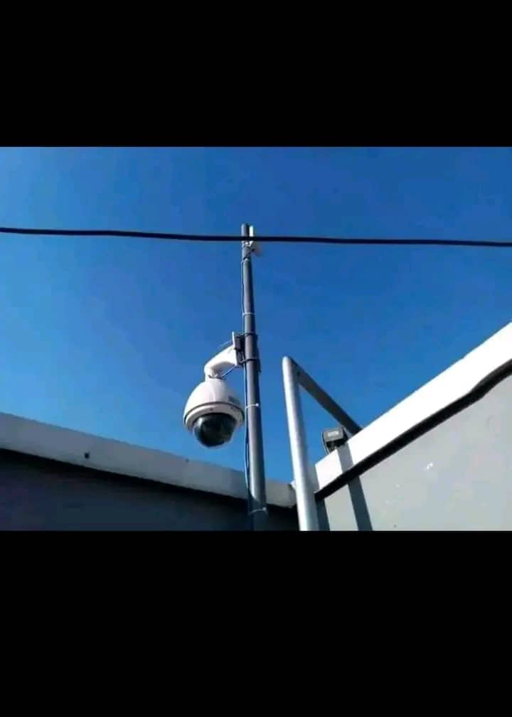 A PTZ camera hanging